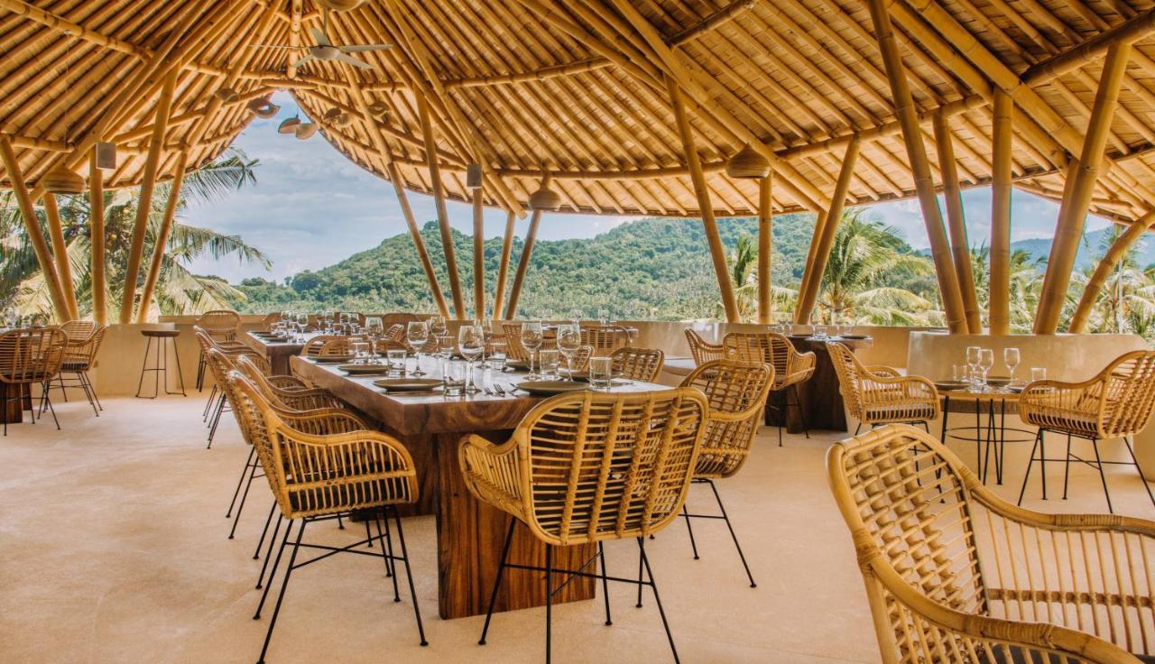 Neano Escape Hotell Manggis Eksteriør bilde The restaurant at the resort