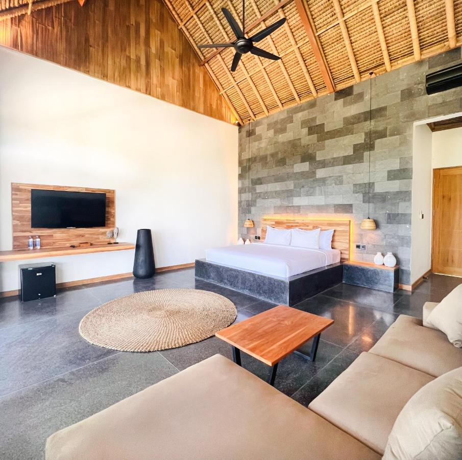 Neano Escape Hotell Manggis Eksteriør bilde A bedroom at the resort