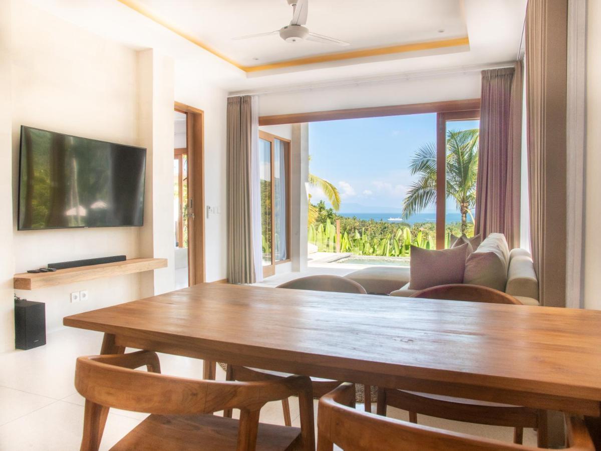 Neano Escape Hotell Manggis Eksteriør bilde Living room at the Beachfront Pool Villa